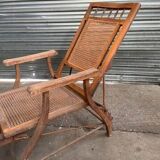 Vintage wooden and cane chaise longue