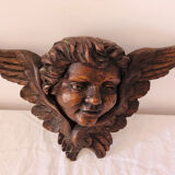 Decoration pediment in solid wood head of ancient angel
