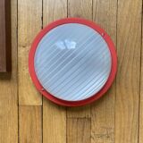 Round glass wall-mounted ceiling light porthole Prisma model Eko red.