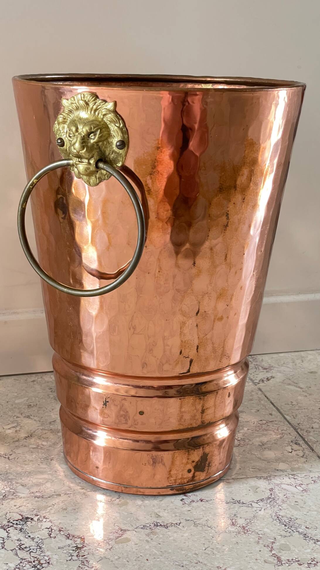 Vintage copper lion's head umbrella holder