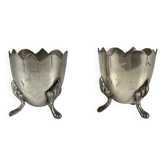 Pair of antique tripod egg cups in maillechort, Art Nouveau style, circa 1900-1925.