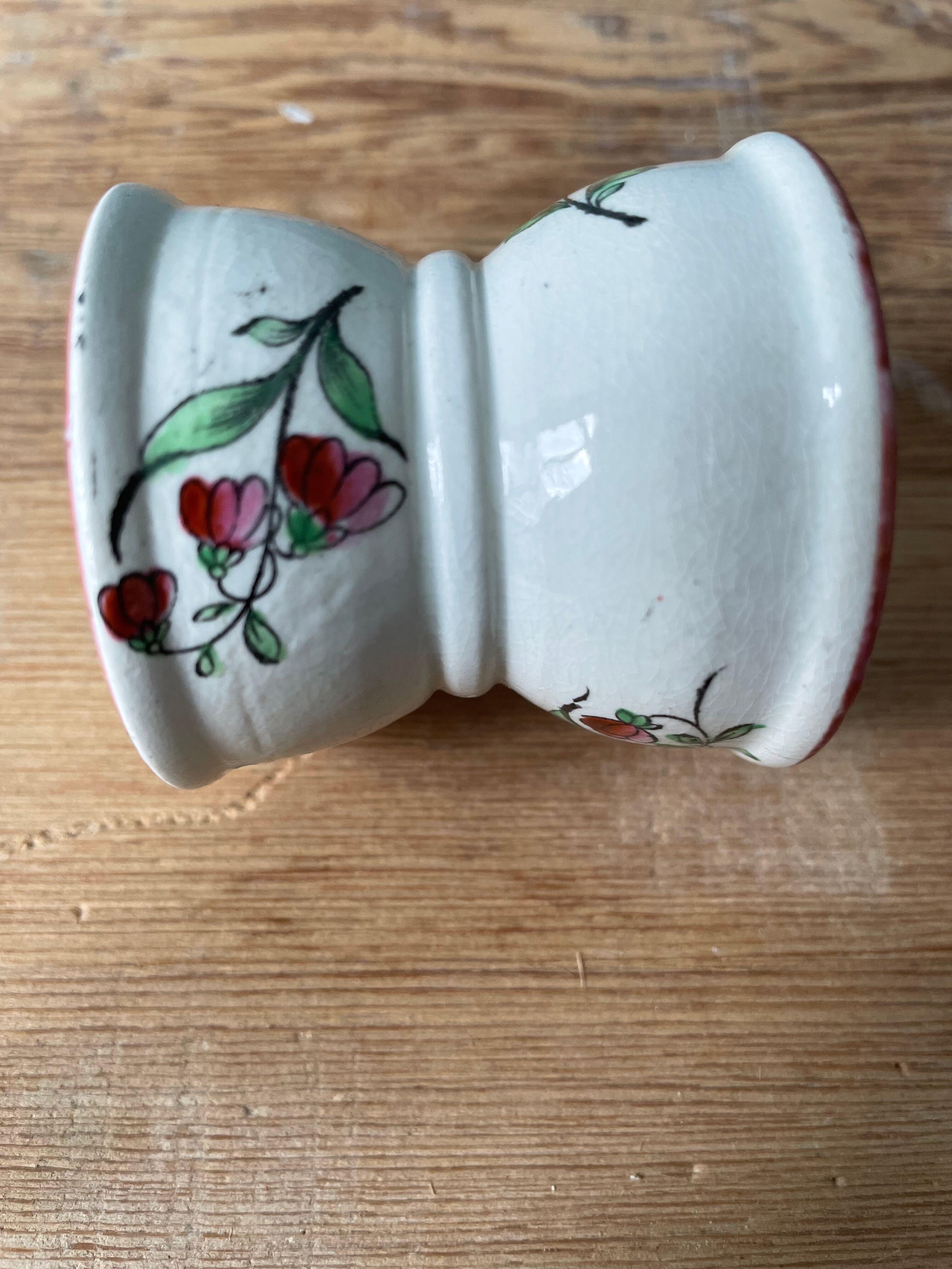 Pair of diabolo eggcups in ancient earthenware