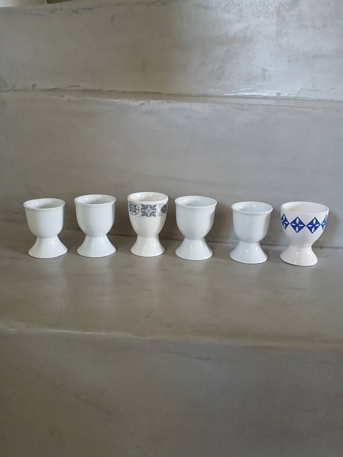 6 mismatched antique egg cups