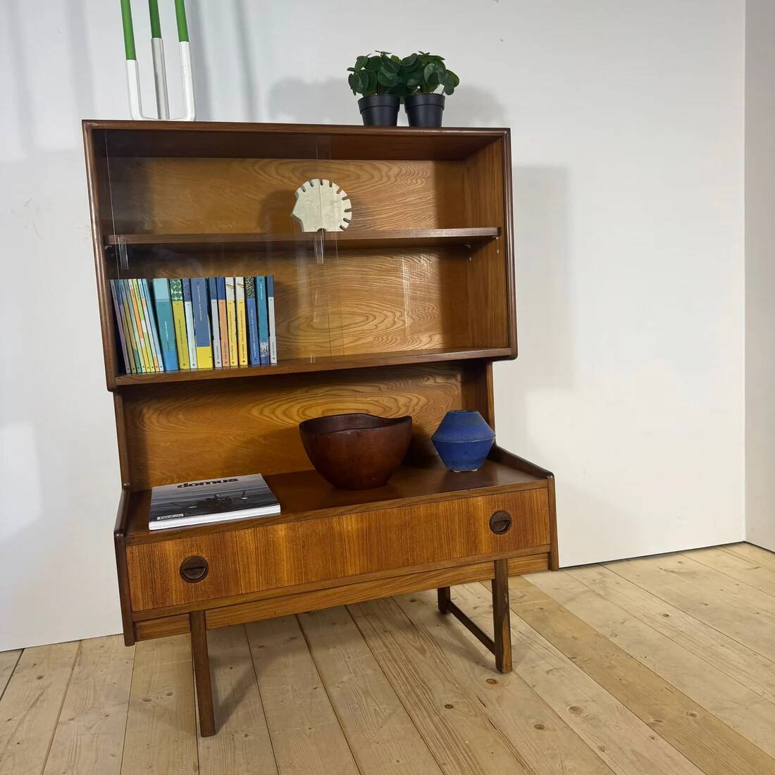 Vintage teak bookcase with glass doors – Scandinavian mid-century elegance
