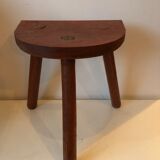 Old wooden tripod stool