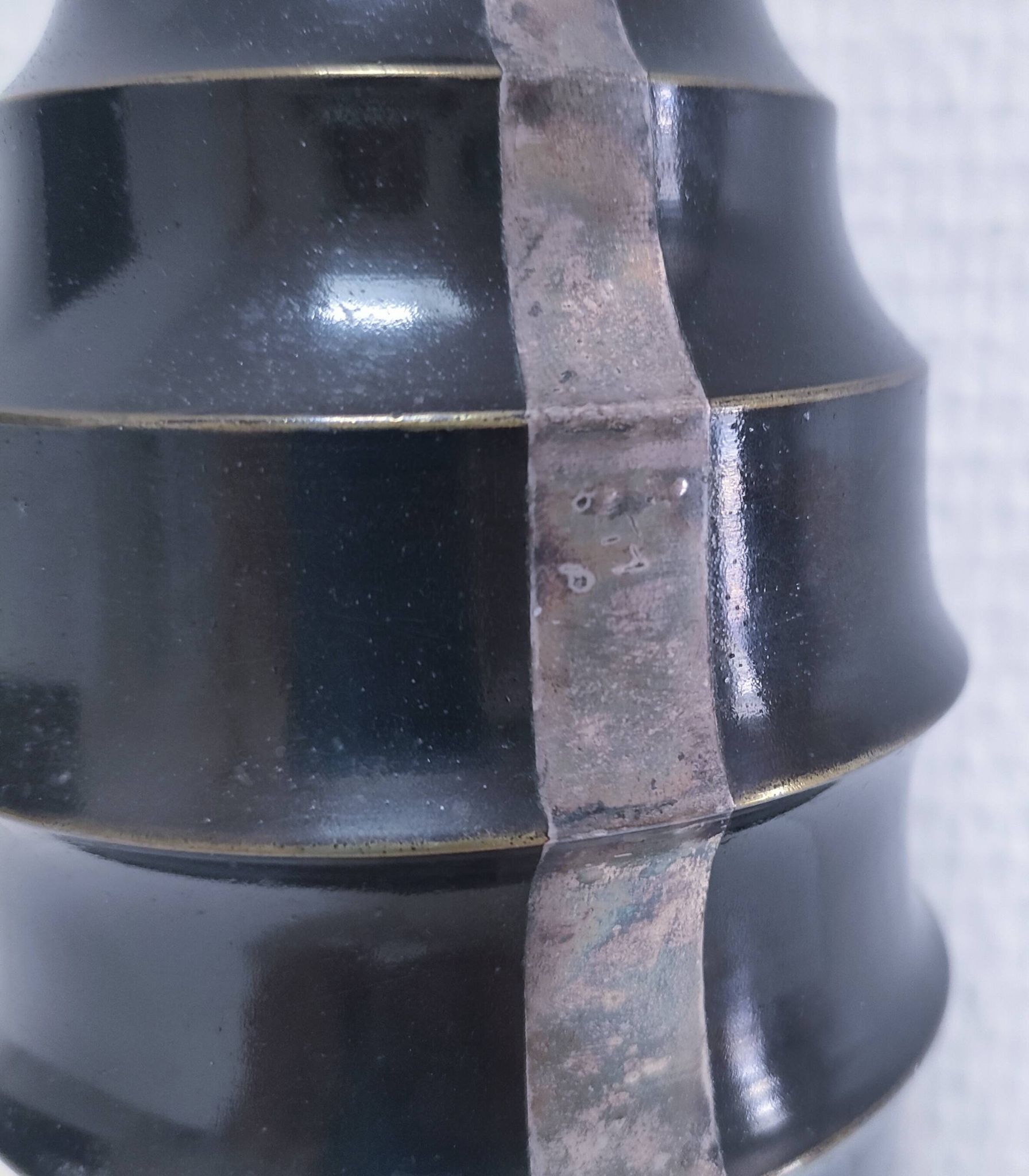 Art Deco metal lamp base with black and silver patina