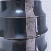 Art Deco metal lamp base with black and silver patina