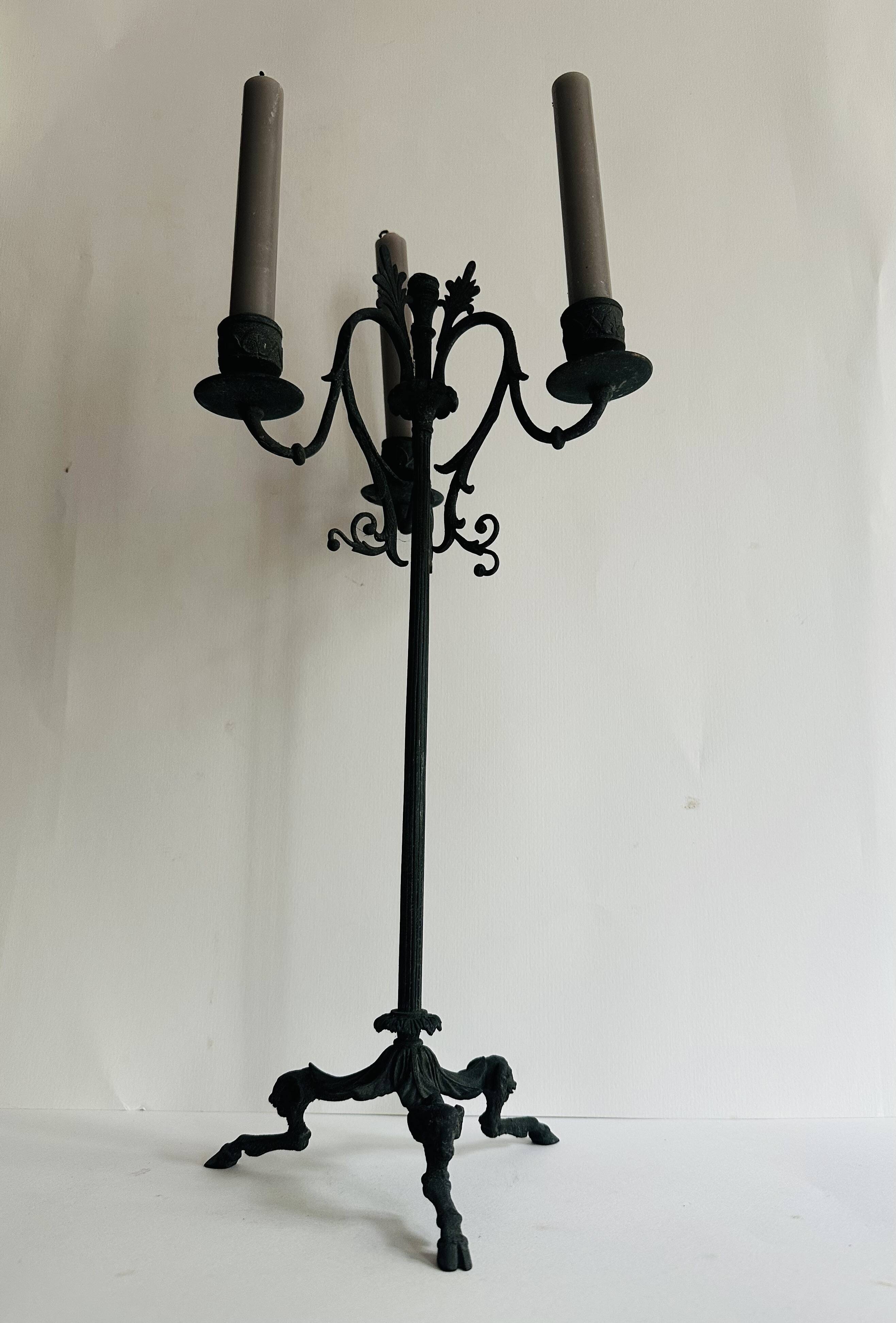 Pair of large Napoleon III candlesticks in patinated bronze