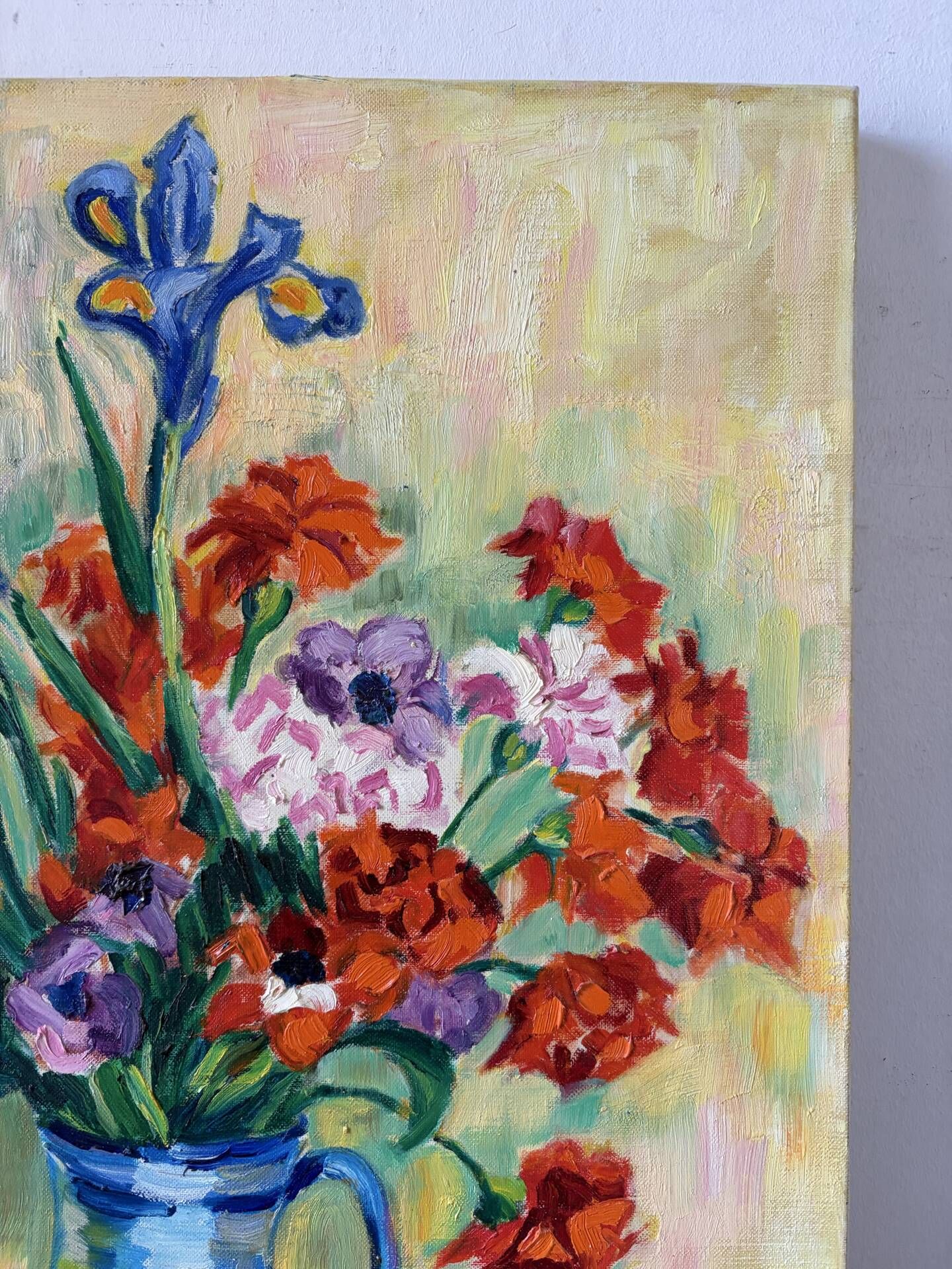 Iris and orange carnations, oil on canvas signed Gisèle Renaut.