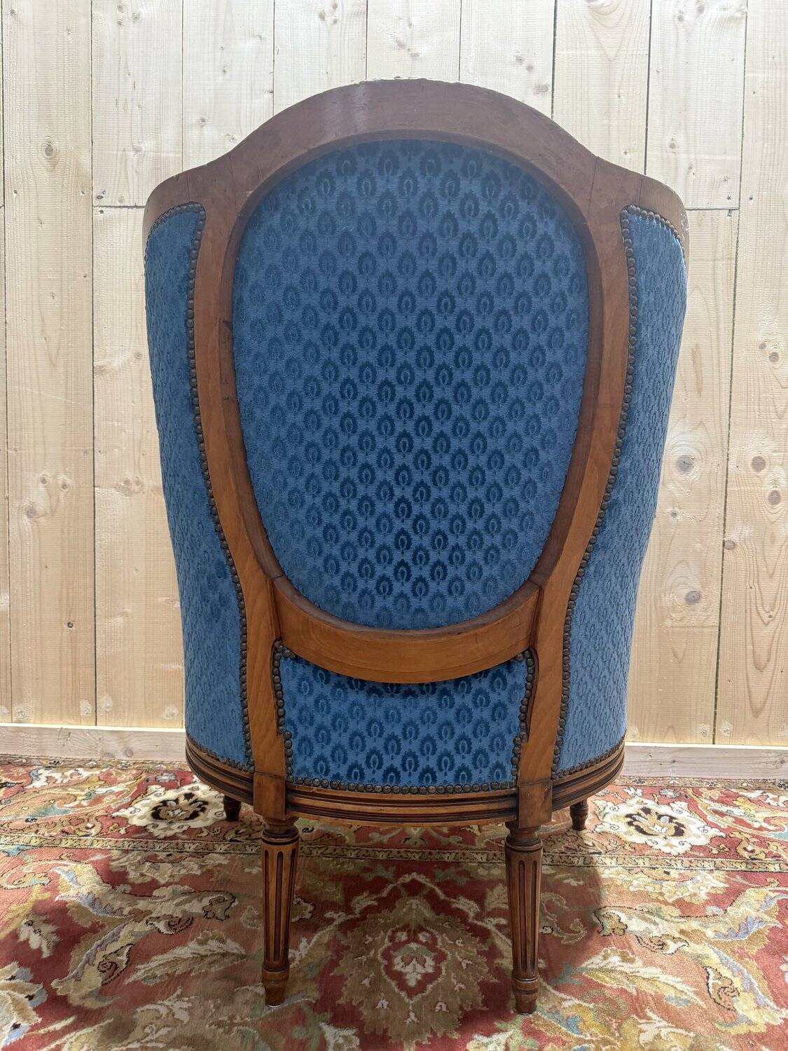Louis XVI style blue velvet wingback armchair