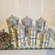 Aluminum and brass spice jars