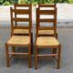 4 solid wood and straw chairs, farmhouse style from the 1950s.