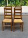 4 solid wood and straw chairs, farmhouse style from the 1950s.