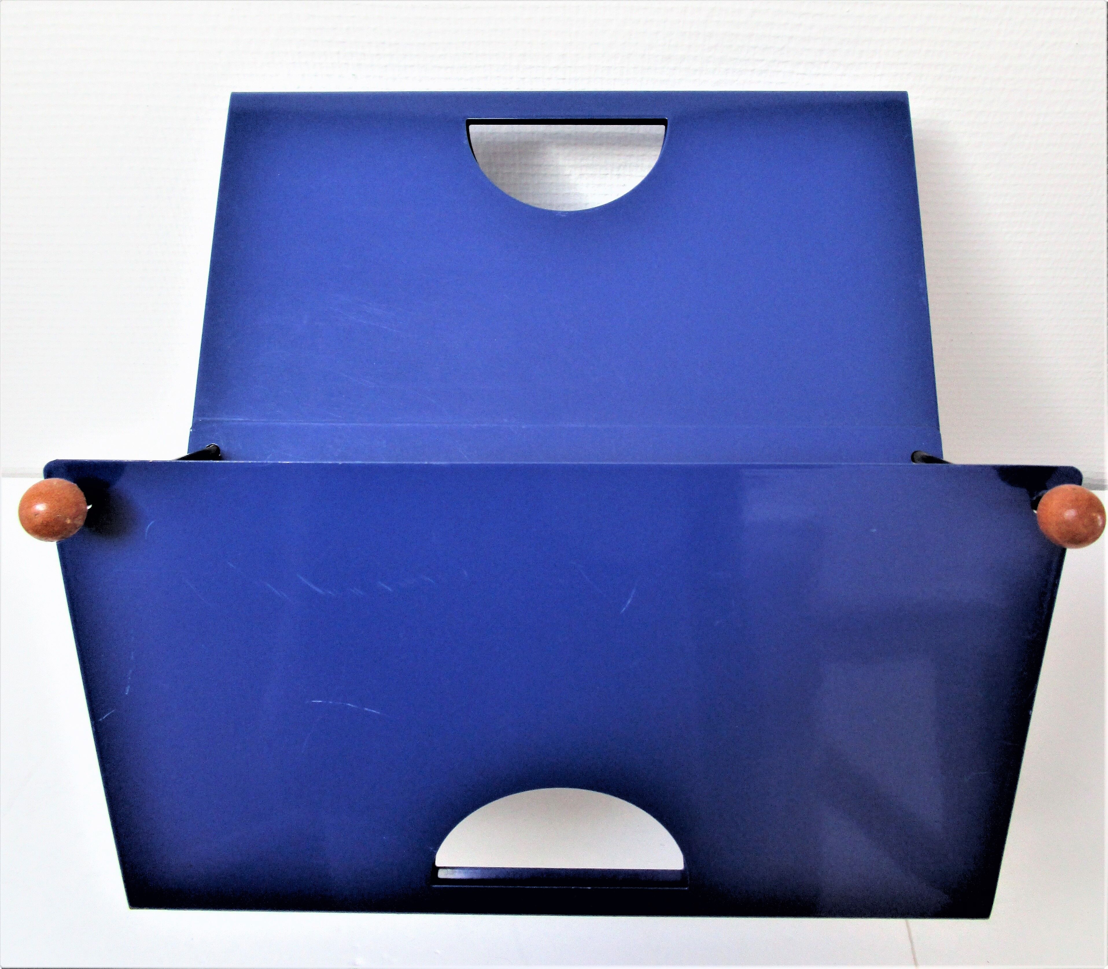 Blue metal magazine holders design 80s