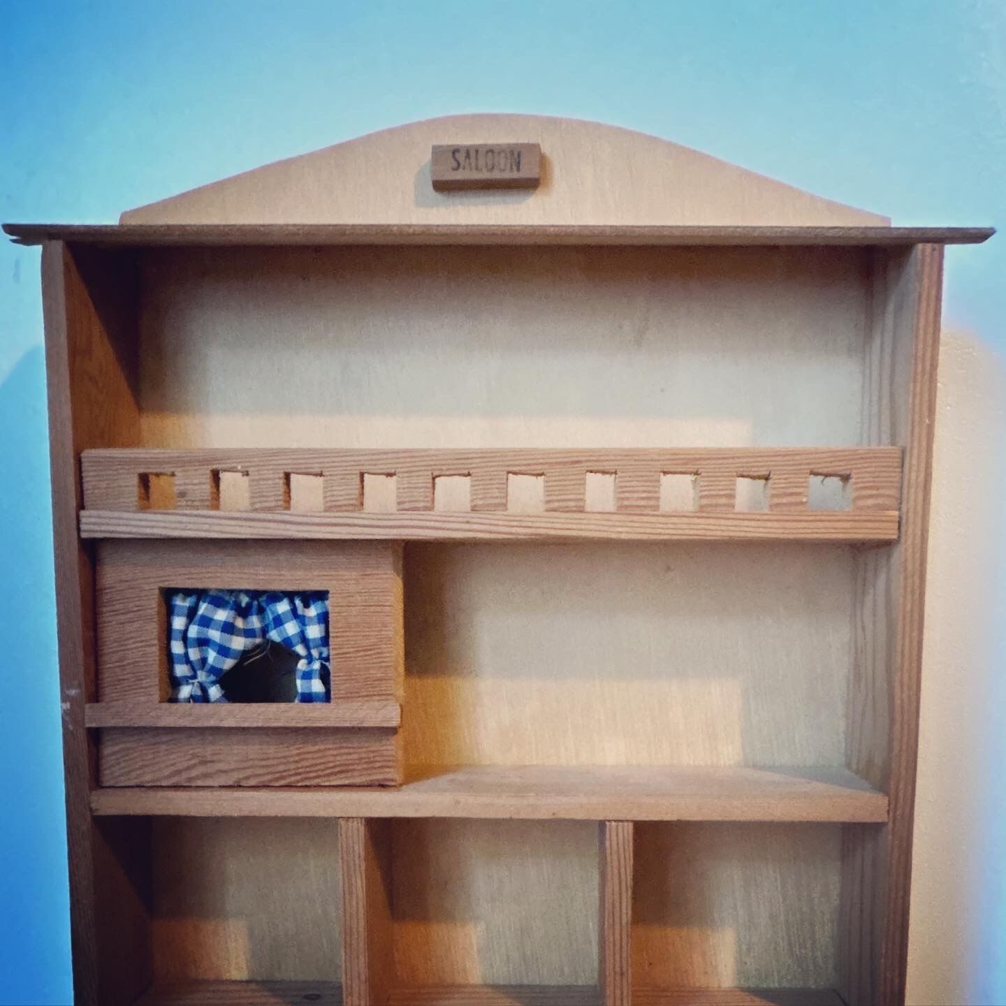 Wooden house shelf