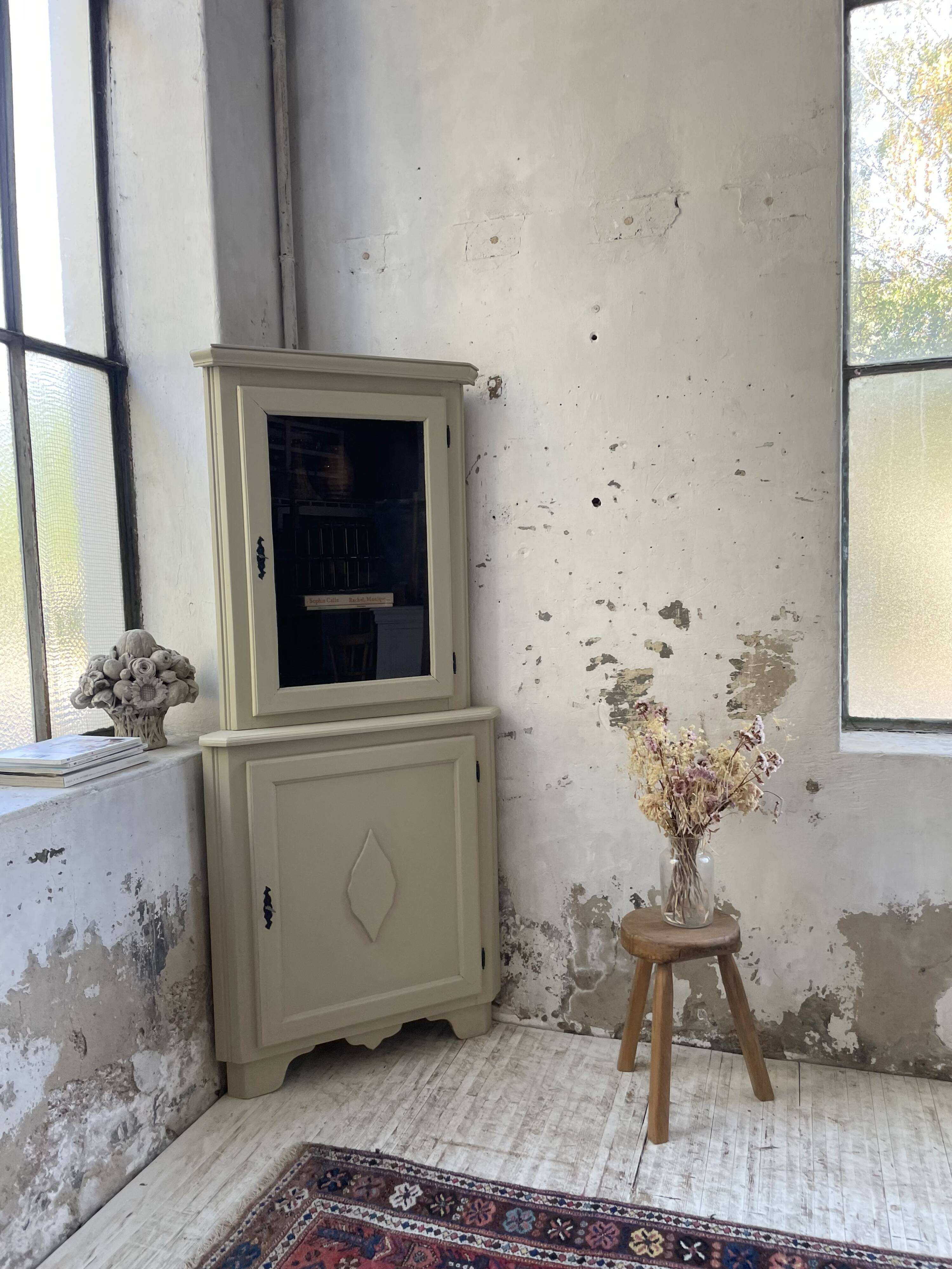 Corner display cabinet from the 1950s