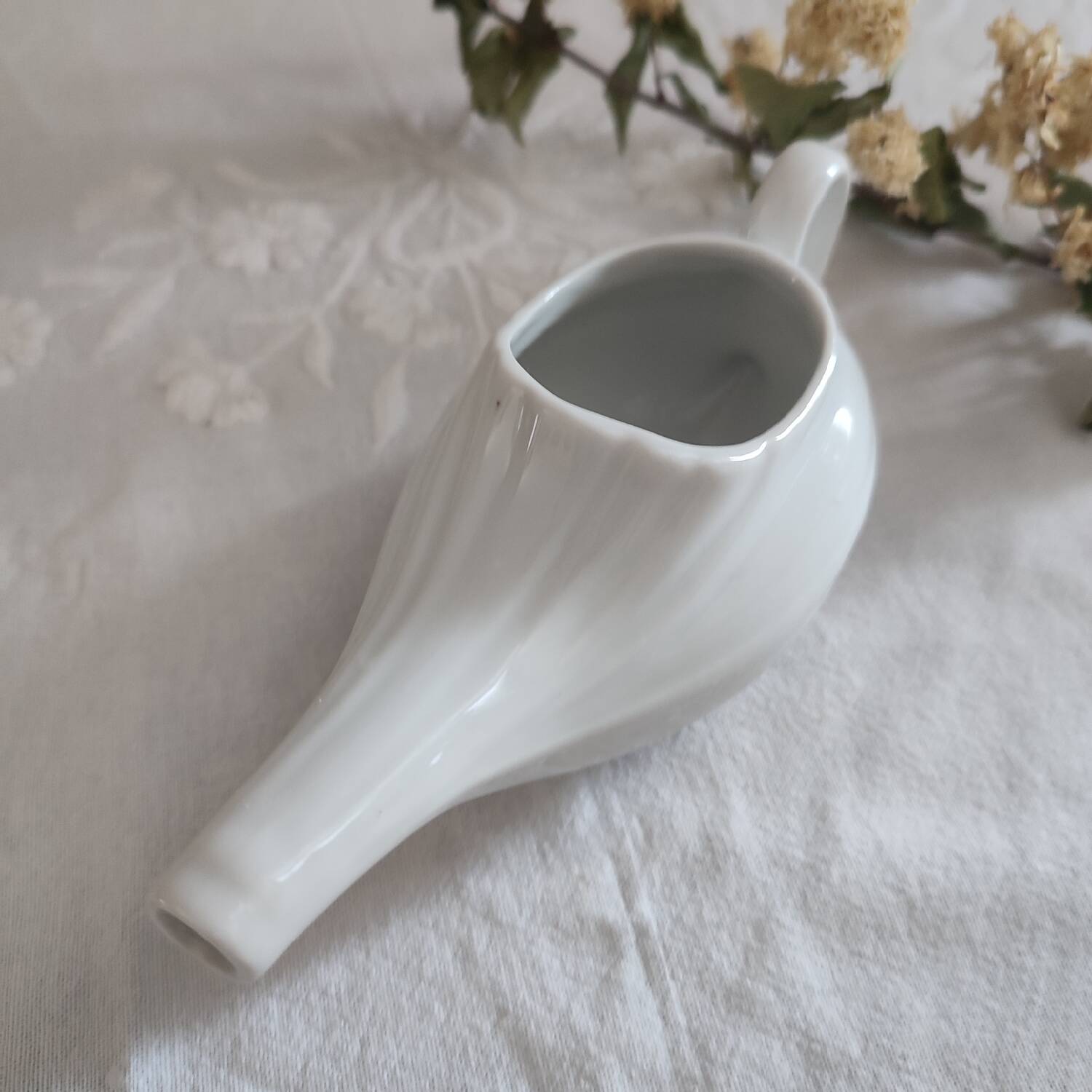 Duo of old white porcelain sauce boats for sick baby bottles