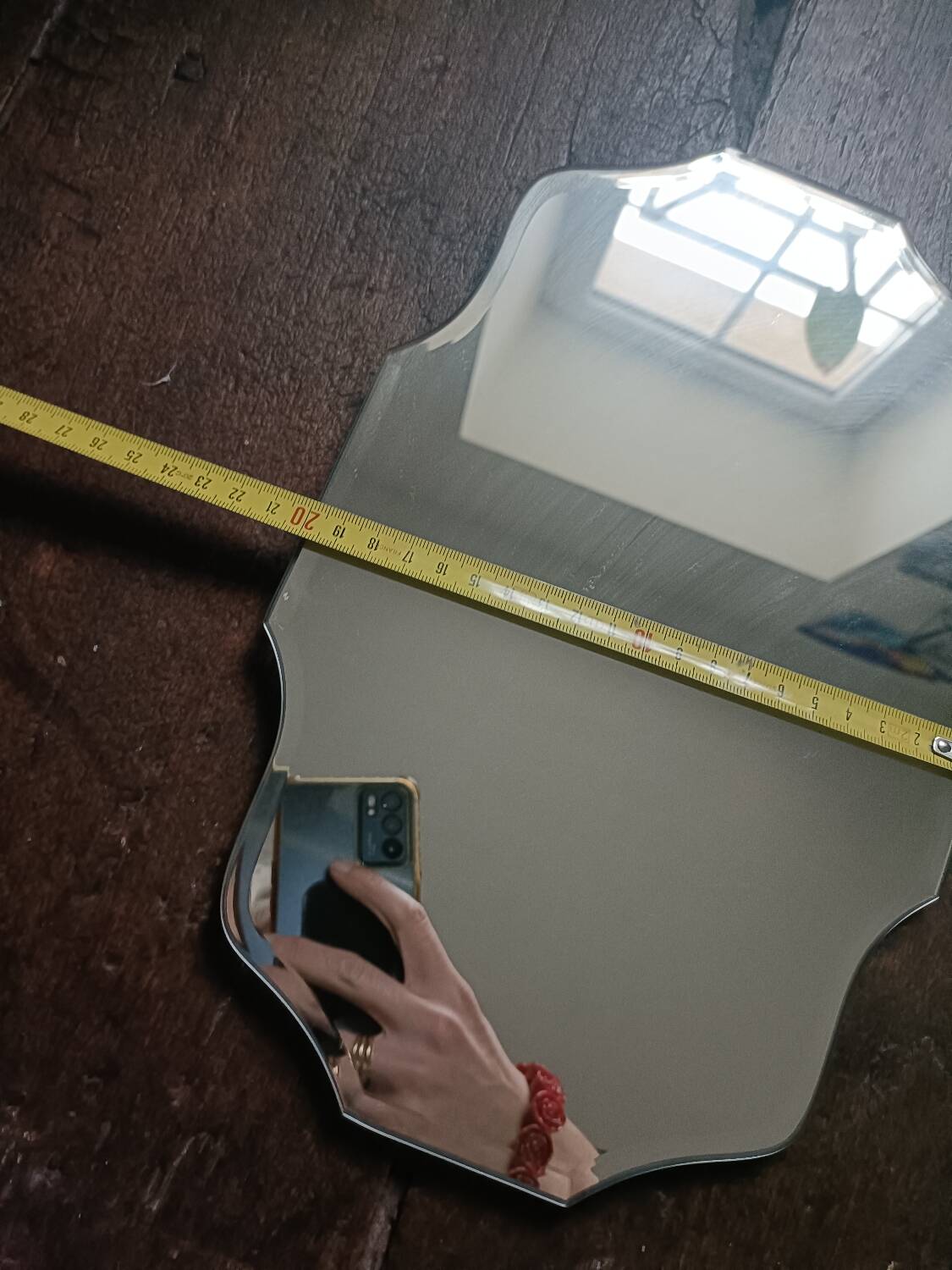 Three beveled mirrors