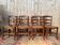 Suite de 8 chaises rustiques style Louis XV en bois fruitier et assises paillées
