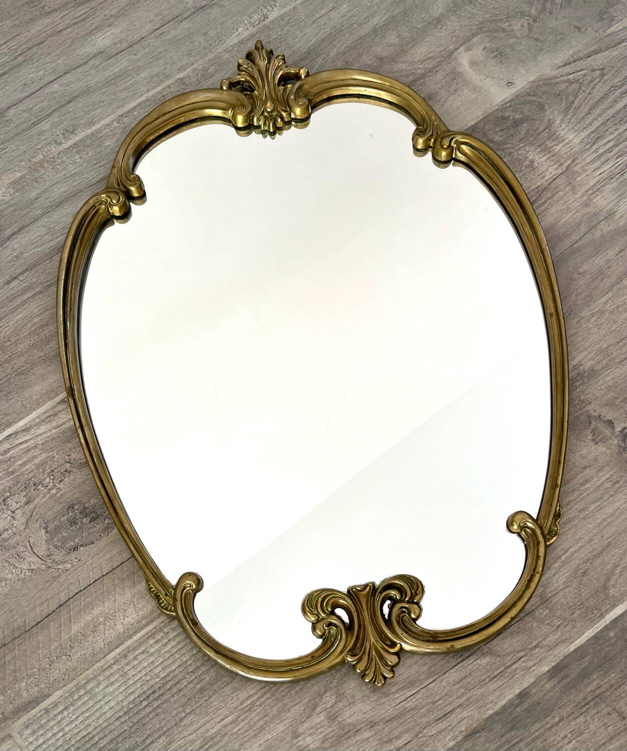 Vintage and rare gilt brass medallion/oblong/olave/rococo mirror