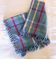 Vintage tablecloth & napkins, blue with multicoloured stripes.