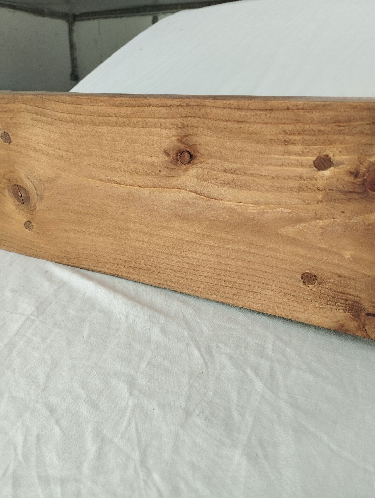 Handcrafted wall shelf in solid fir.