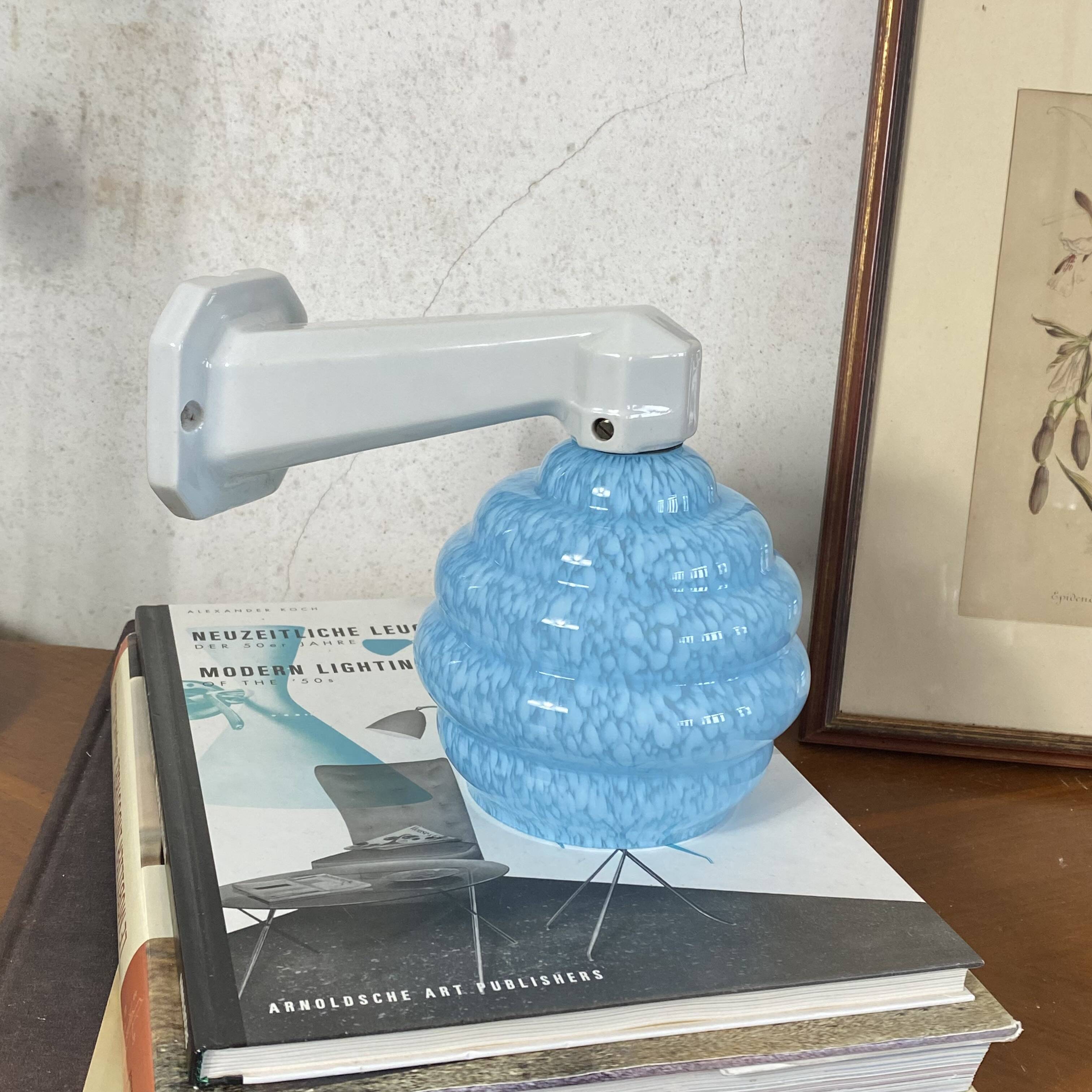 Ceramic wall lamp with a swan neck and blue glass globe Clichy