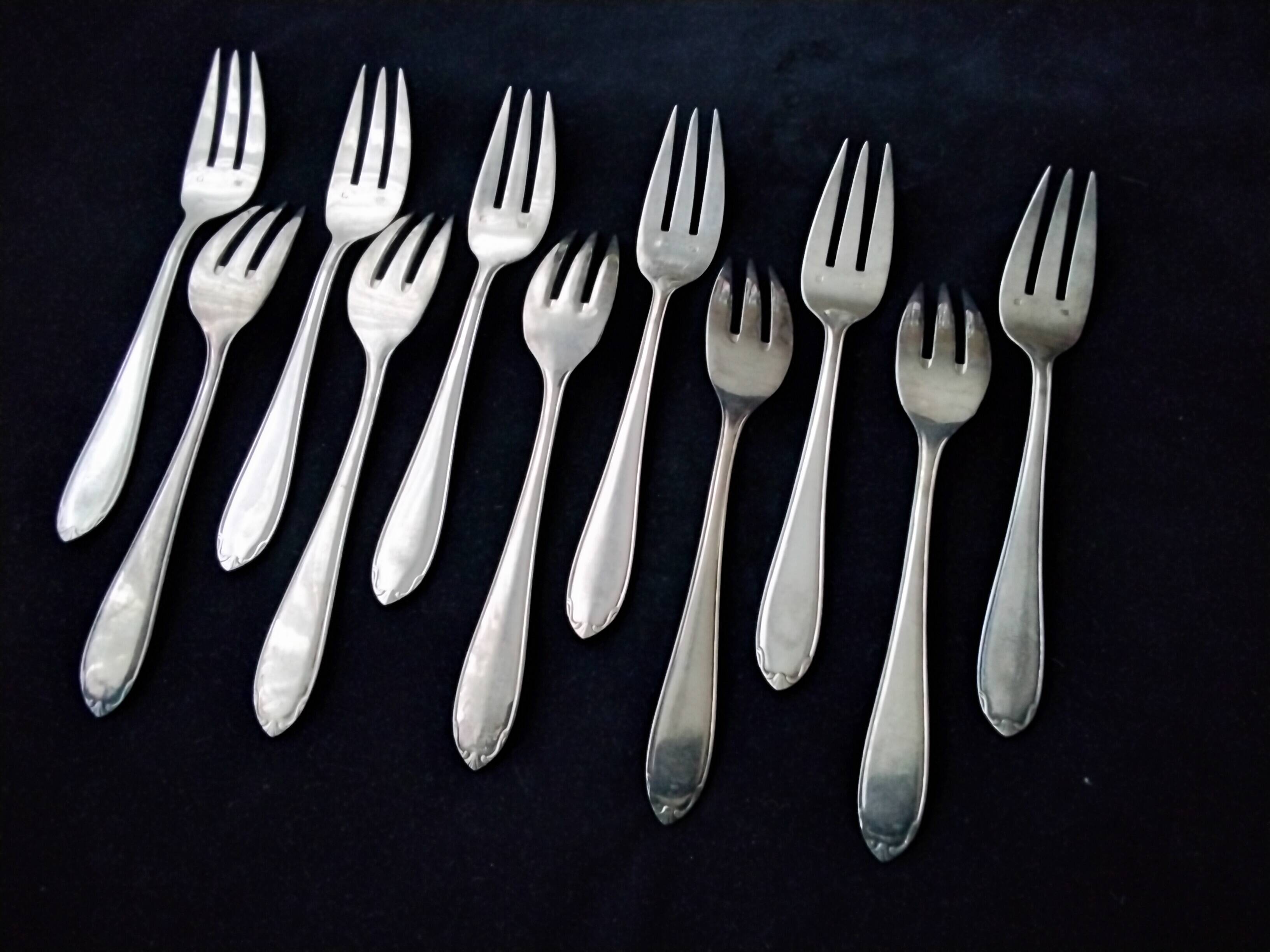 10 silver-plated fish forks