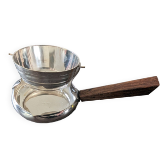 Tilting tea strainer in silver metal and rosewood