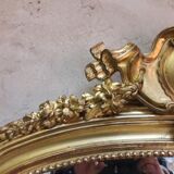 Golden mirror with pediment XIXth