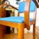 Bridge armchair in wood and blue skaï