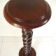 Saddle or walnut pedestal turned in twist