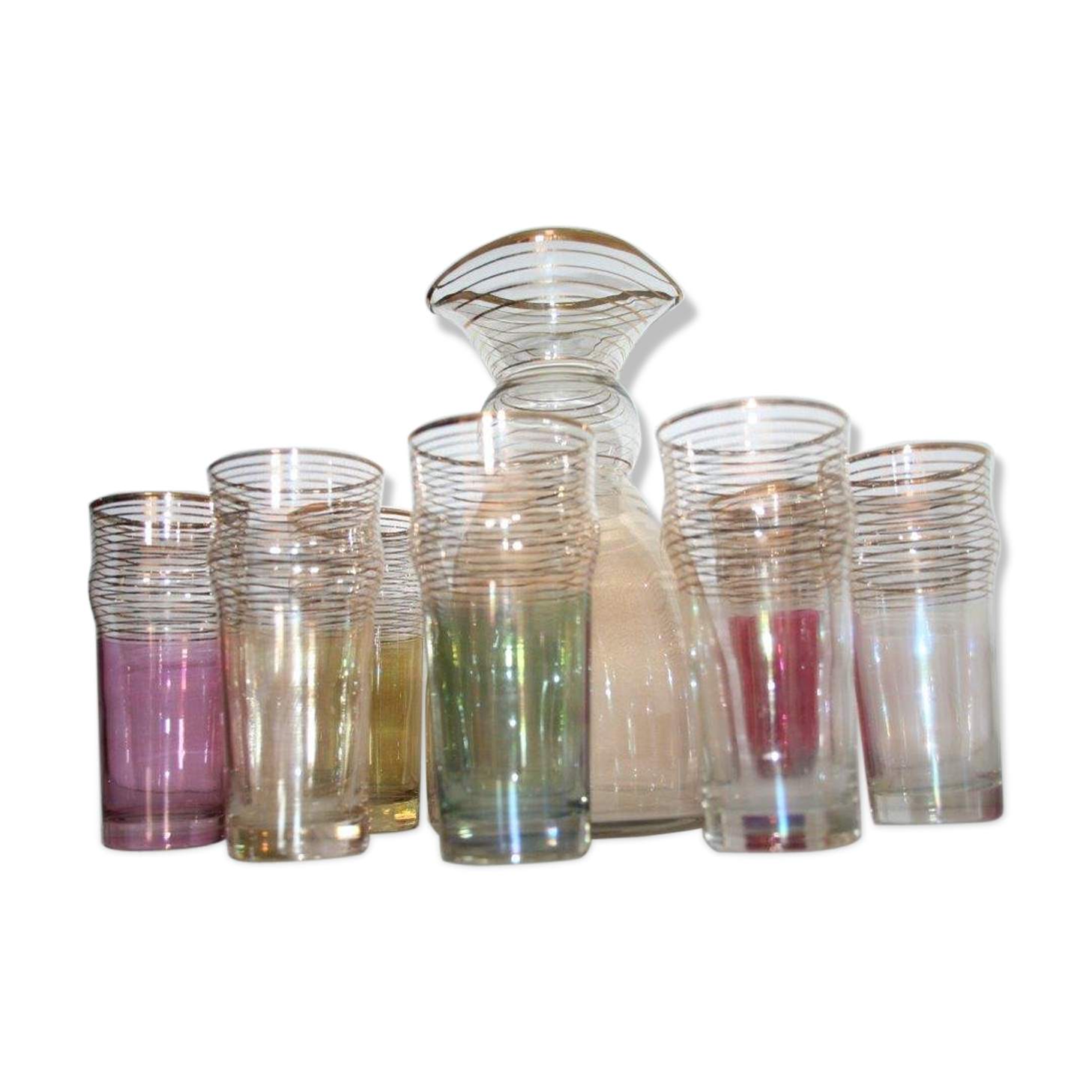 Service has lemonade pitcher and 7 glasses glass