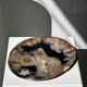 Large empty pocket or dish in petrified wood
