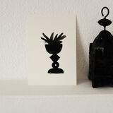 Black vase with N.1 plant