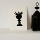 Black vase with N.1 plant