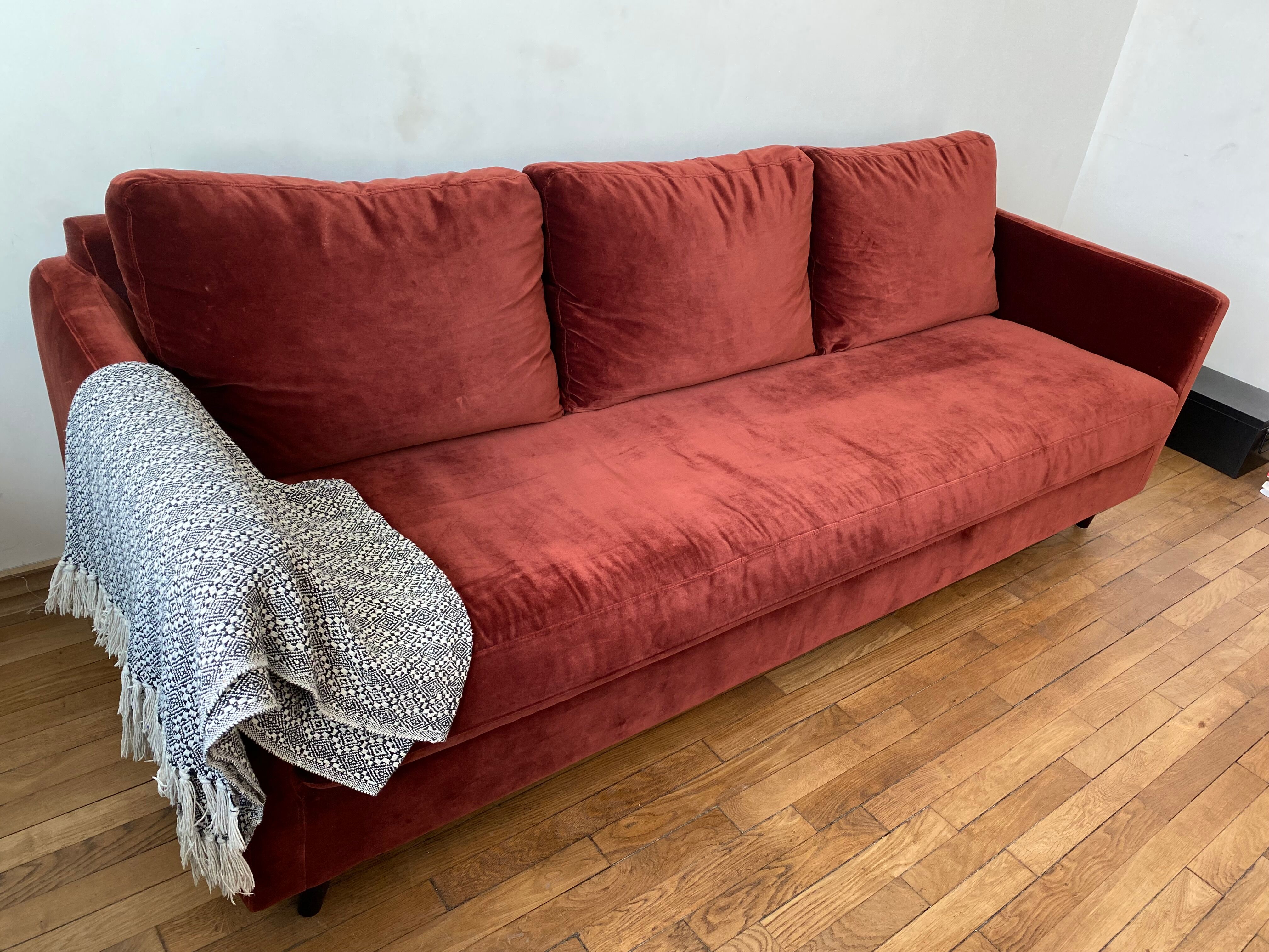 Terracotta convertible velvet sofa
