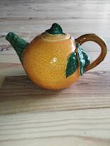 Vintage ceramic teapot in the shape of an orange – 1950s