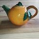 Vintage ceramic teapot in the shape of an orange – 1950s