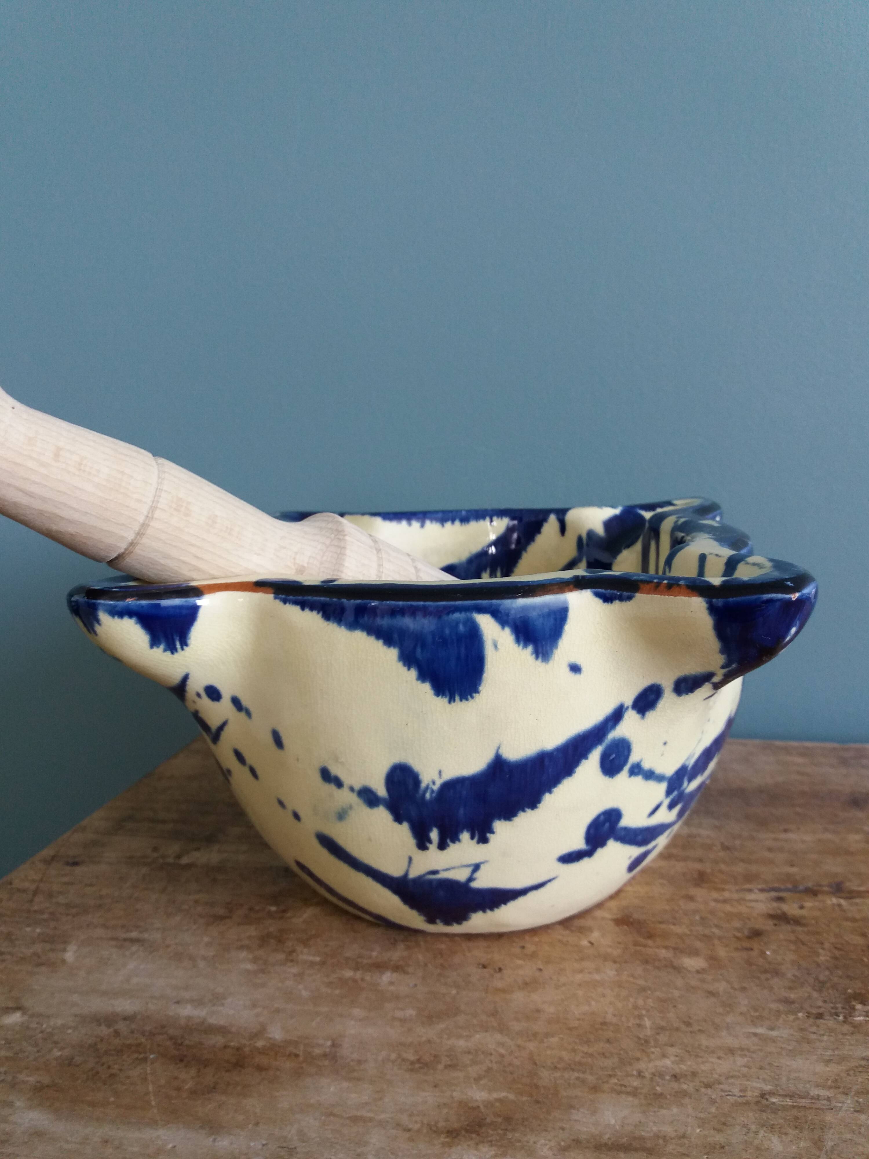 Glazed terracotta mortar and wooden pestle