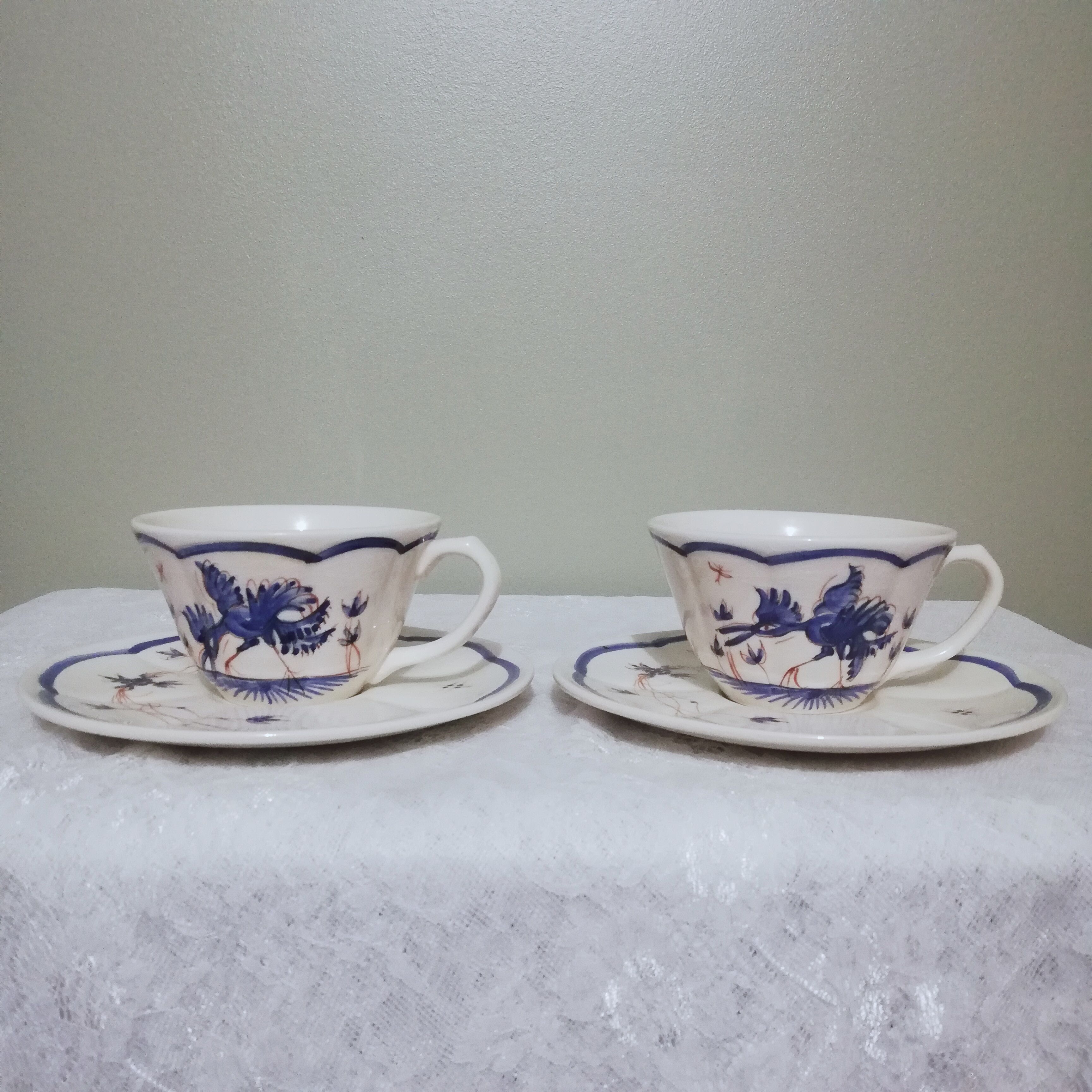 Two ceramic cups by Grignan signed Peguet