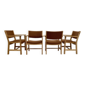 SUITE DE 4 FAUTEUILS ESTAMPILLE "HANS WEGNER" 1960.
