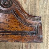 Cornice pediment in low relief in wood