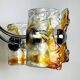 Mid-century chandelier in amber Murano and chrome by Toni Zuccheri for Mazzega, Italy, 1970s.