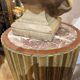 Large fluted golden wood column with a marble top, work from around 1900.