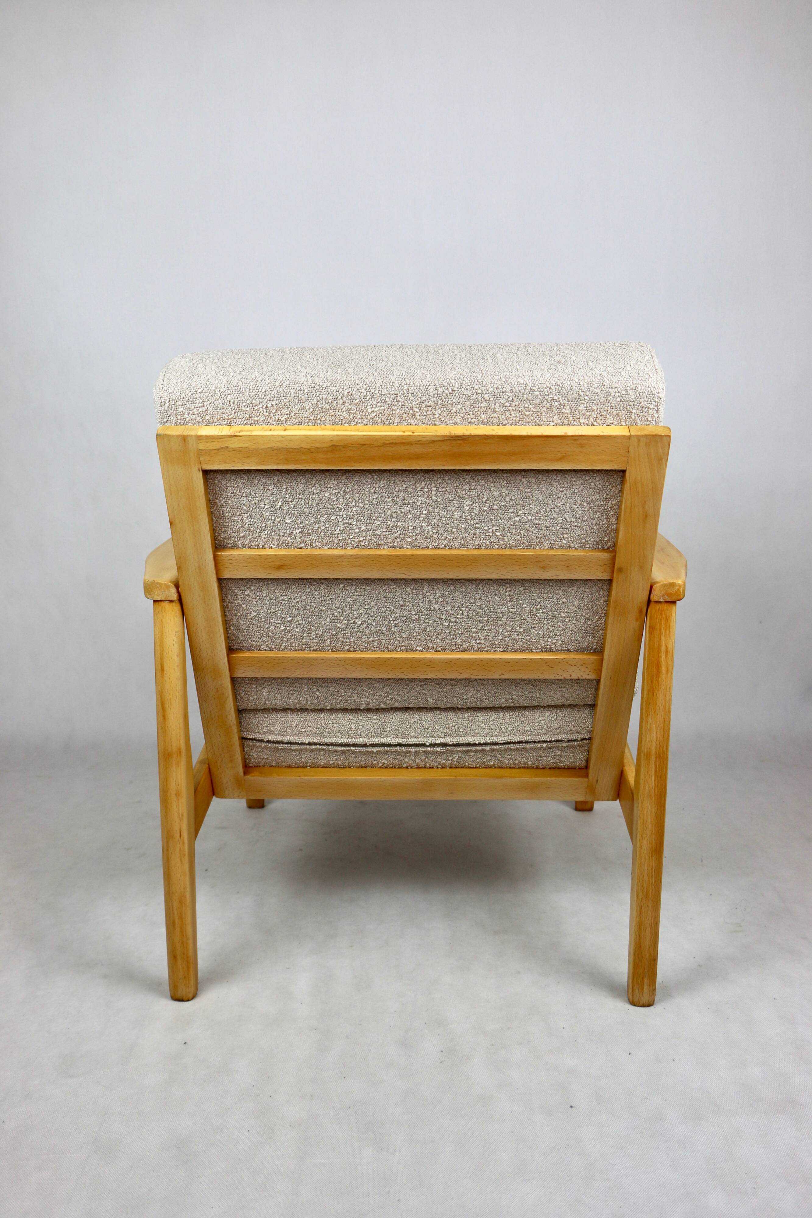 Vintage Danish armchair, 1970s, beige boucle - light wood - 2 pieces available