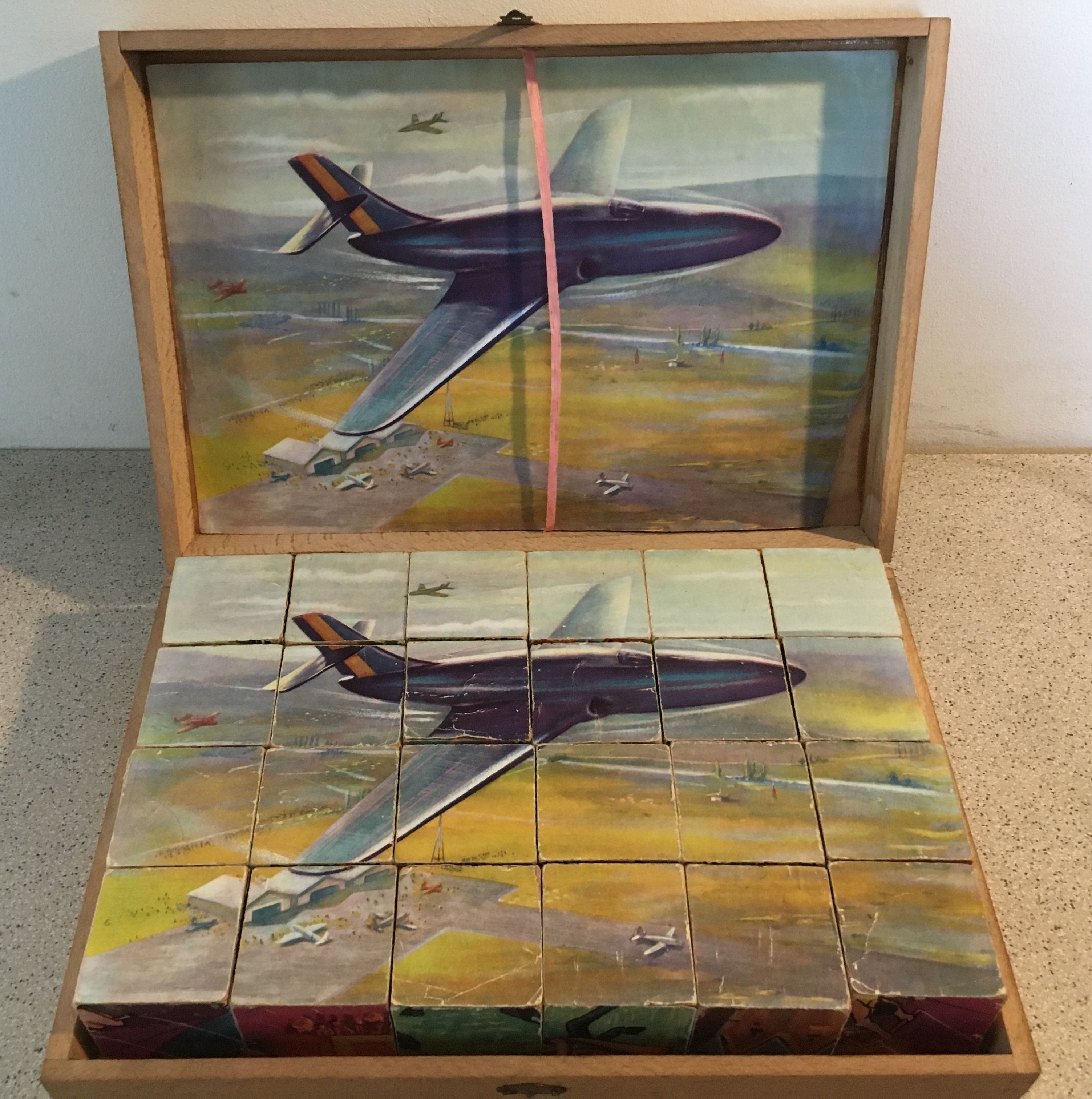 Old game of 24 wooden puzzle cubes from the 1950s