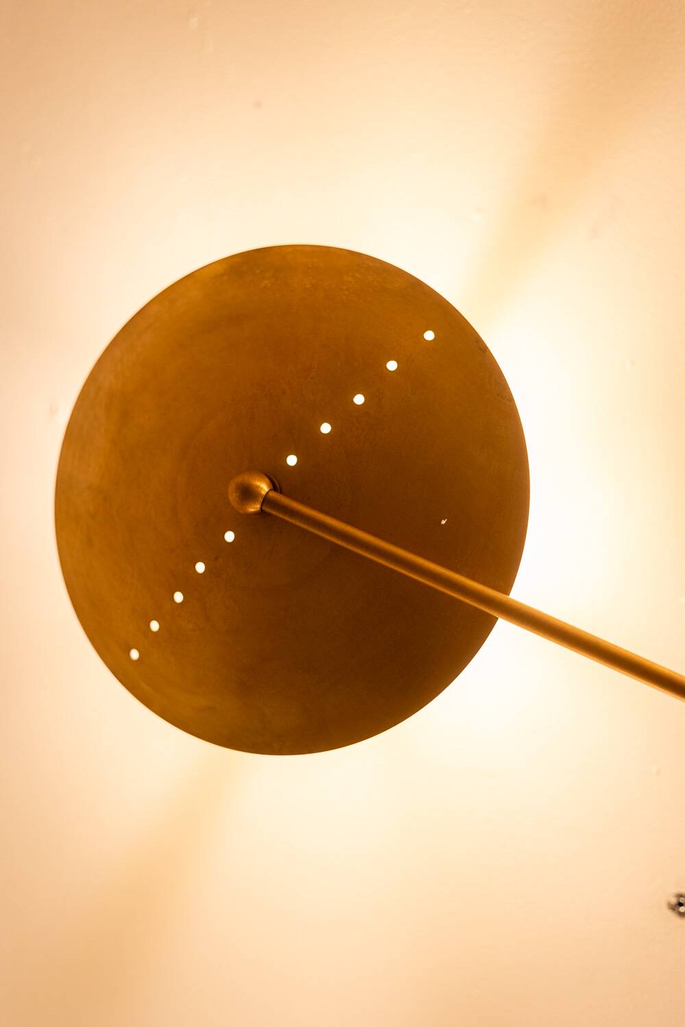 6-light wall sconce in patinated brass, contemporary work