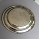 round plate in punched silver metal