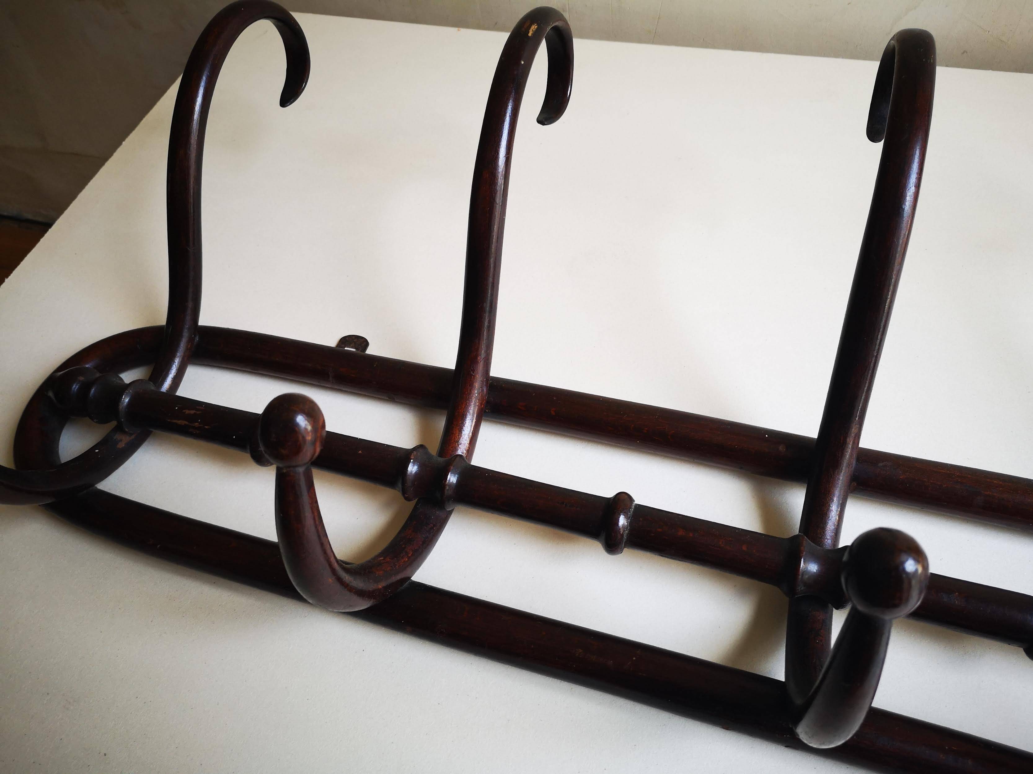 Vintage wooden wall coat rack